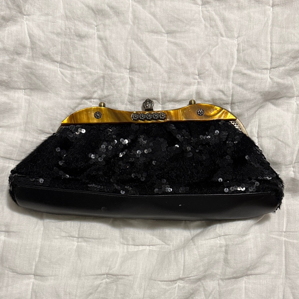 Elegant Black and Gold Sequin Clutch